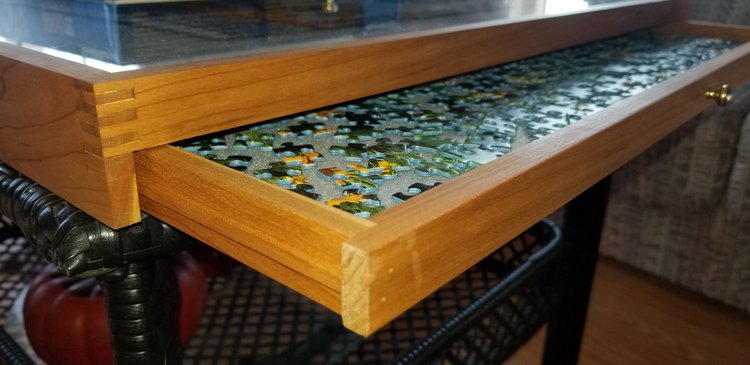 Puzzle tray with two pullout trays