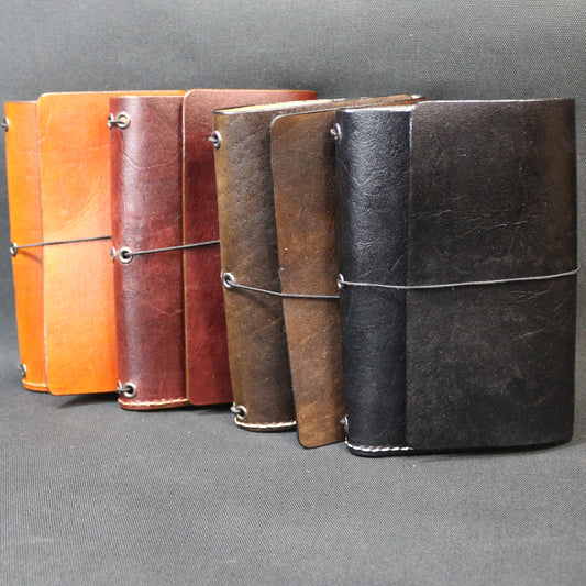 Leather bound passport and notebook holder
